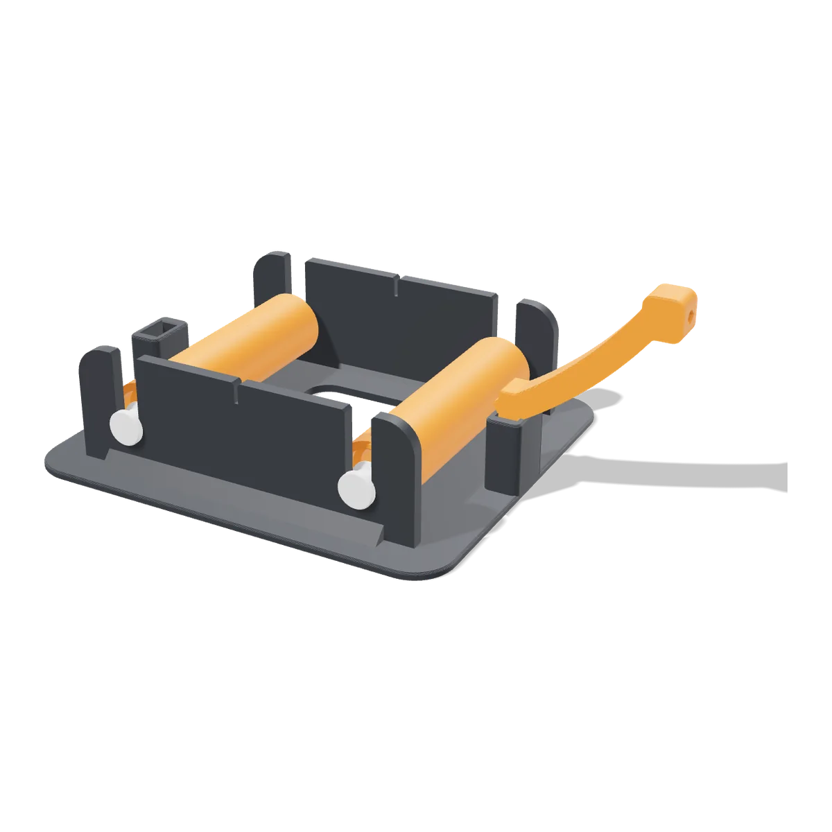 The empty stand: graphite base with side walls, two orange rollers on white axle pegs and the curved filament guide